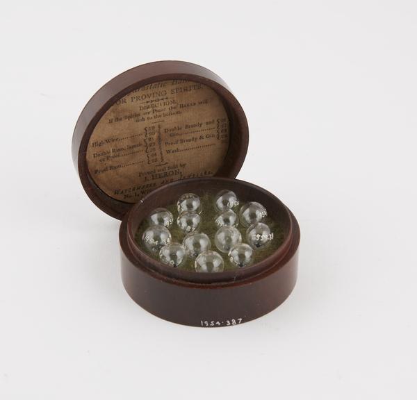 Thirteen hydrostatic balls for proving spirits, by J. Heron, no