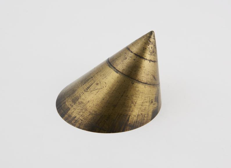 'Diagonal' brass cone, made of three circular cut sections