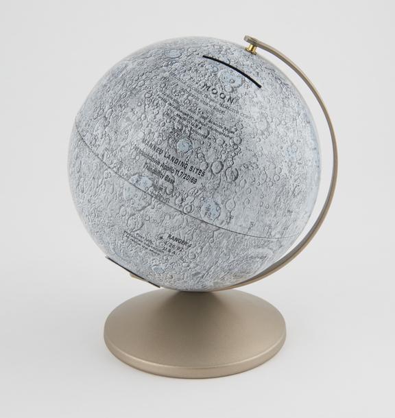 Lunar globe, with booklet The Story of the Moon' by R.I