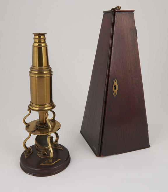 Brass Culpeper microscope with wood base, in pyramidal box