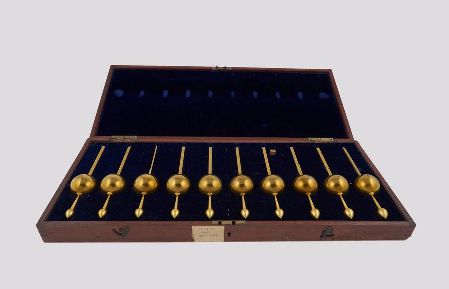 Set of ten gilt Sikes-type standard hydrometers