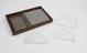 Cloth lined shallow box containing thirteen pieces of glass