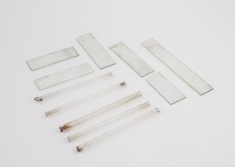 Box containing six glass strips, four rectangular panes, three square ...