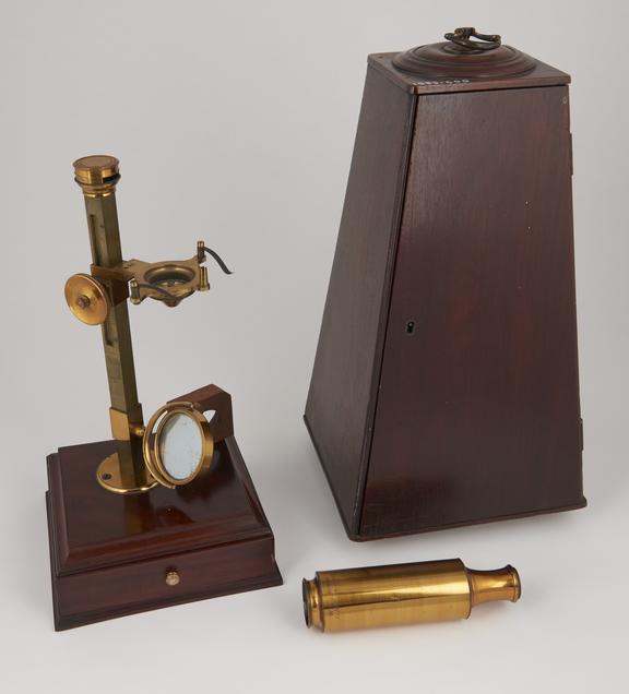 Pillar microscope in pyramidal case