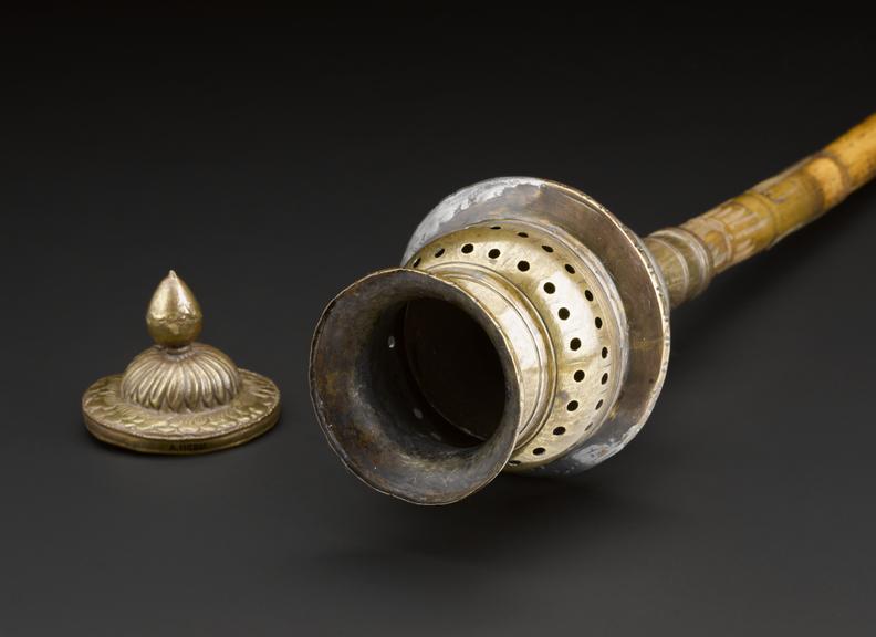 Copy of a fumigating torch carried for protection against bubonic ...