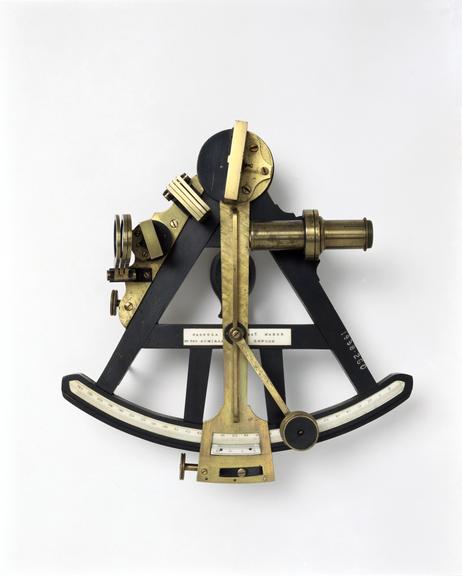 Ebony and brass sextant.