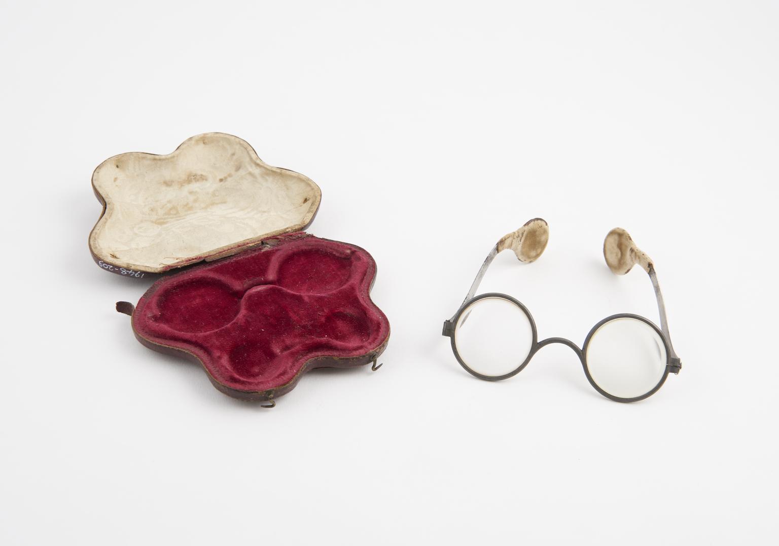 Spectacle Object Iron framed spectacles with padded temple pieces, in leather case ...