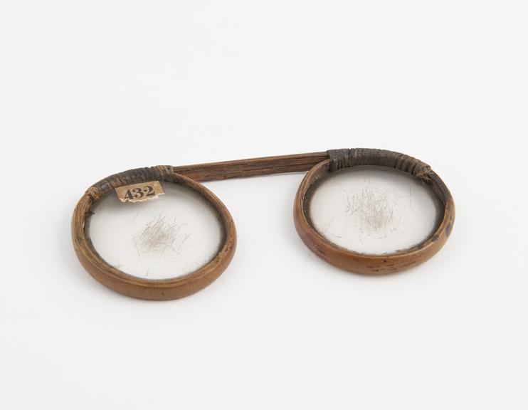 Bow spectacles in bamboo frames, with fibre bindings