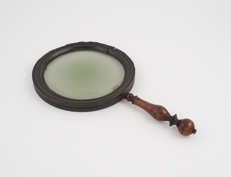 Reading lens in wooden frame and handle