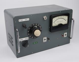 Power and control unit for supplying heating current to high temperature cell on microscope