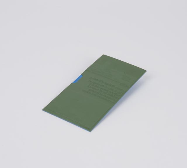 Laminated thermoplastic plate with laminated facing and backing