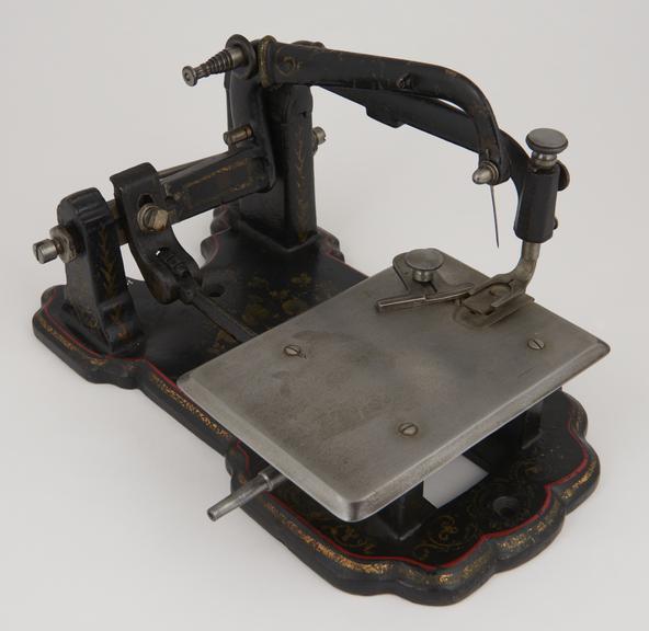 Head of a lock stitch treadle powered sewing machine, by S