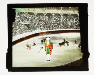 Magic lantern pose slide showing a bullfighter in an arena