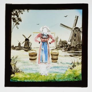 Magic lantern pose slide showing a woman in Dutch dress holding milk pails