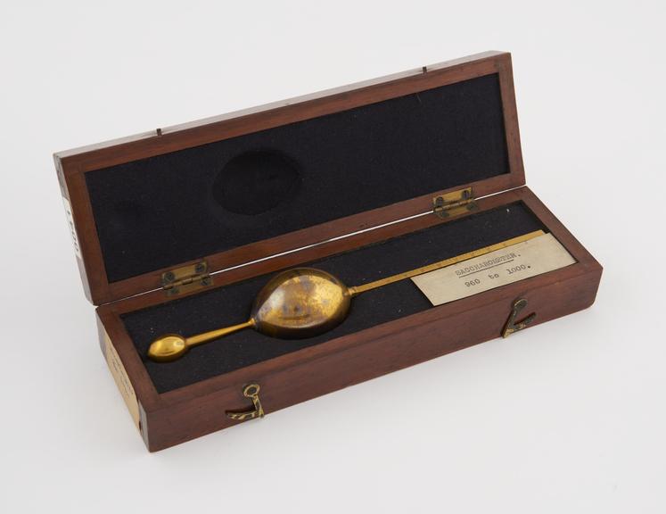 Gilt saccharometer, in mahogany box. Range 960 - 1000.