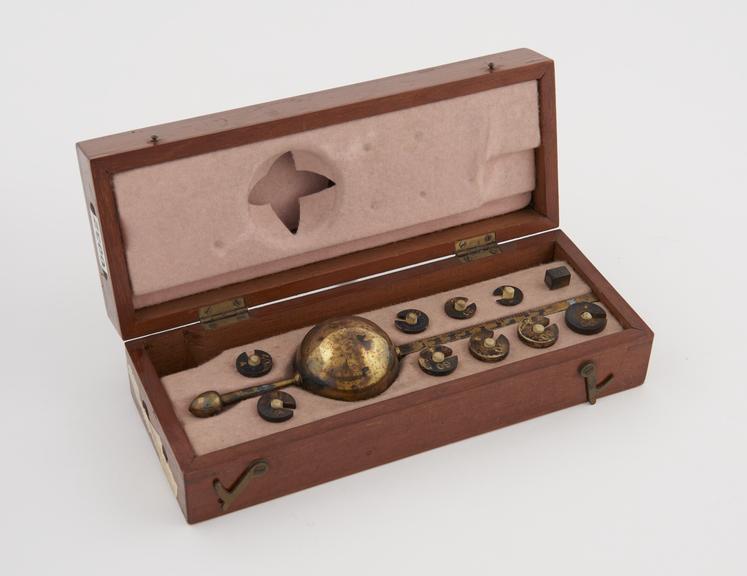 Gilt Sikes excise hydrometer by J Hicks, with ten weights