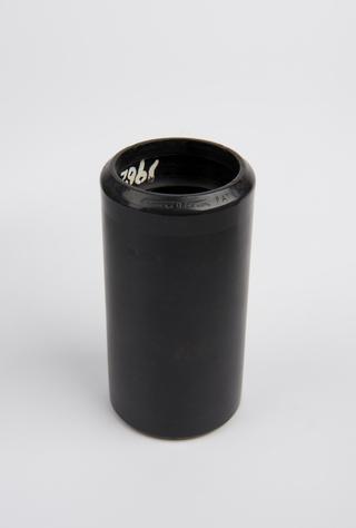 Black wax phonograph cylinder with bevelled edge and engraved song title inscription