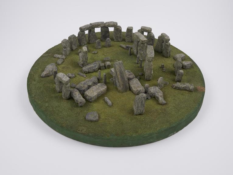 Plaster model of Stonehenge on wooden base made by Mr Joseph