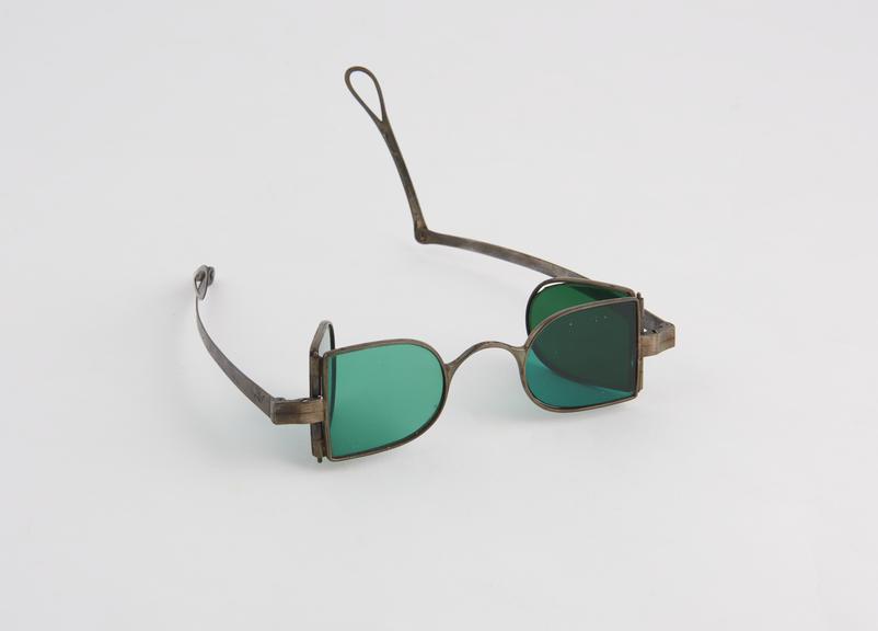 Silver 'preserver' spectacles with two sets of D-shaped green