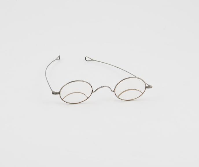 English metal frame spectacles with oval split segment bi-focal