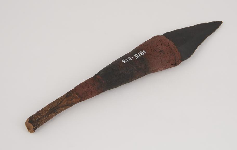 Flint spear head mounted in handle, from South Africa