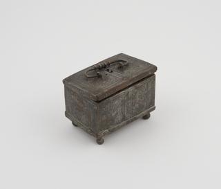 Small steel coffer with elaborate lock mechanism in lid