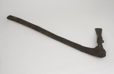 Reproduction of a bronze axe with wooden haft