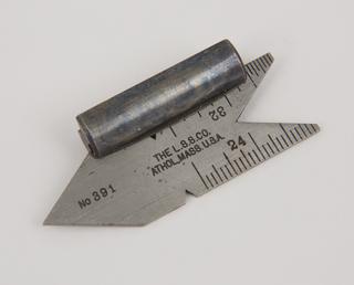 Steel thread gauge for American 60 degree threads.