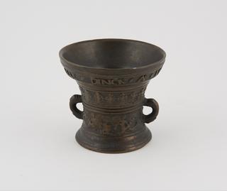 Bronze mortar with floral decoration and inscription