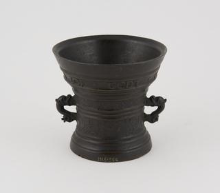 Bronze mortar with handles and inscription