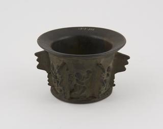 Mortar with wings and dancing figures