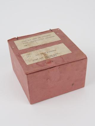 Box for empty tin of plum pudding