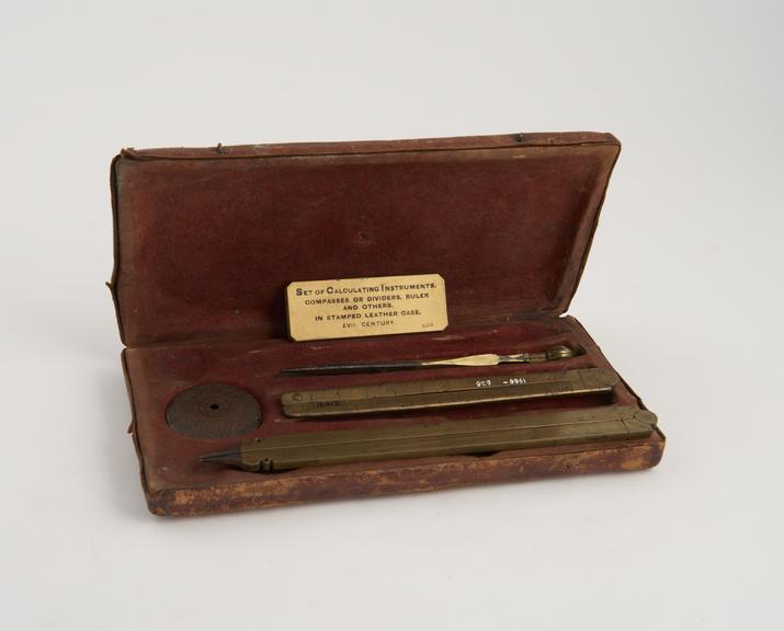 Fitted, leather-covered case for drawing instruments