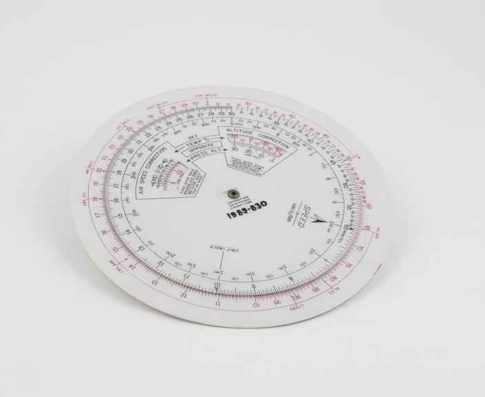 Circular slide rule for aviation calculations by Cox & Stevens