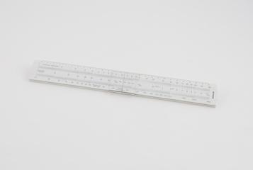 Slide rule with single slider and cursor for traffic flow calculations