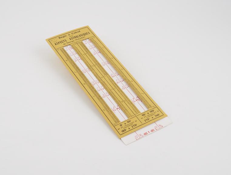 Astrological calculator in slide-rule format, cardboard