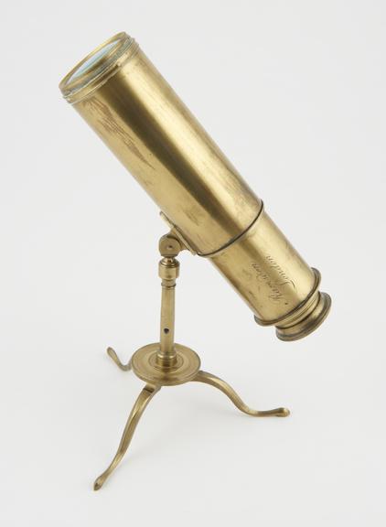 Galilean refracting telescope on folding tripod