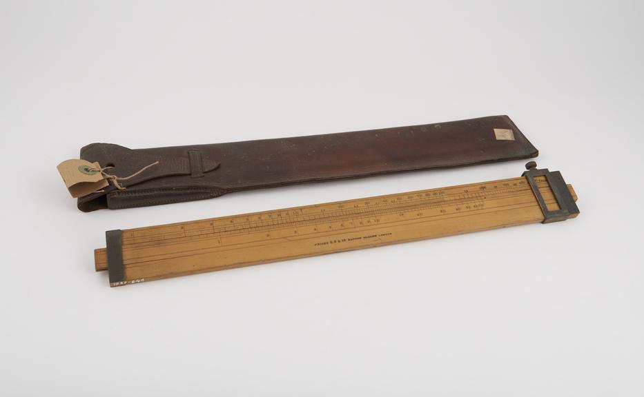 Wooden slide rule for artillery rangefinding, with cursor, by J