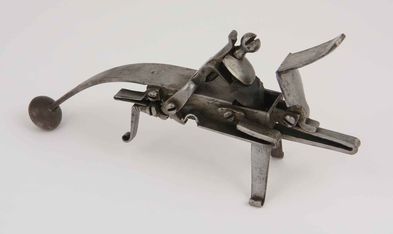 Tinder box with flint lock mechanism | Science Museum Group Collection