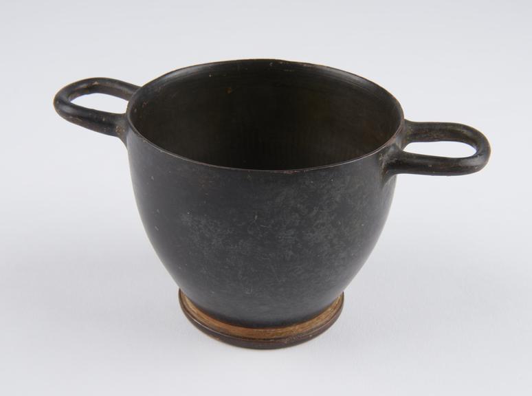 One of four Southern Italian black and red banded earthenware