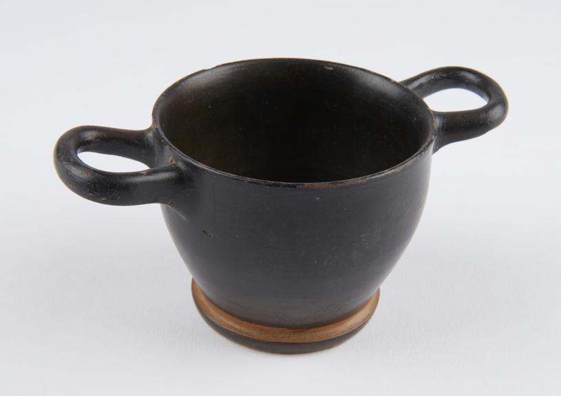 One of four Southern Italian black and red banded earthenware