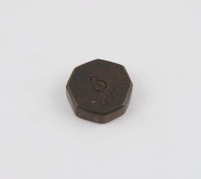 One of four Indian copper weights, octagonal flat