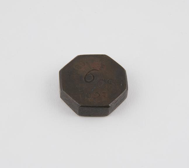 One of four Indian copper weights, octagonal flat