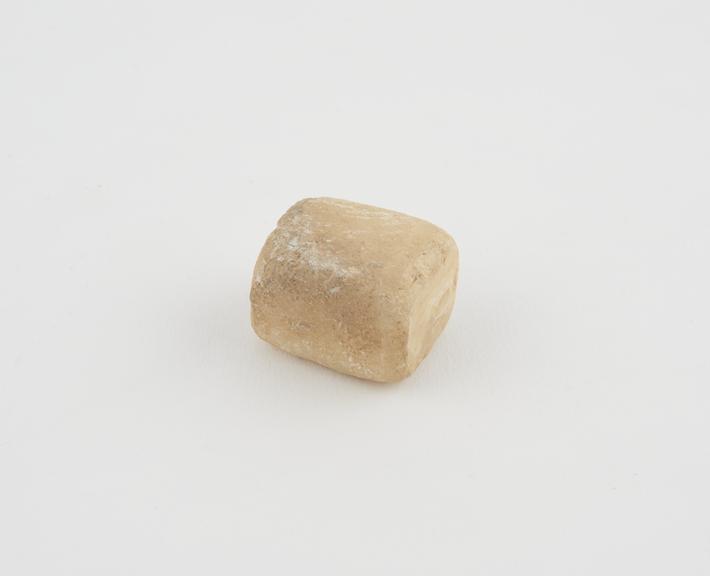 One alabaster Syrian weight, rectangular rounded corners