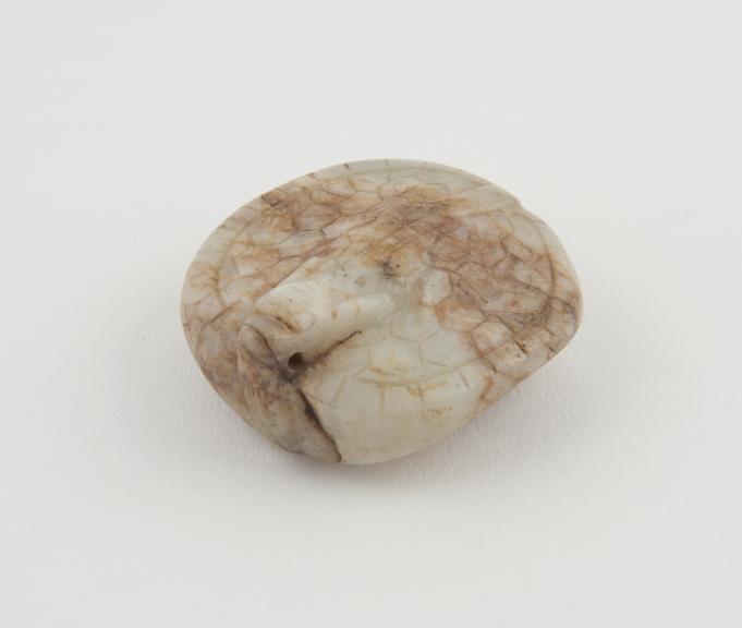 Chinese weight of white jade, with brown marking