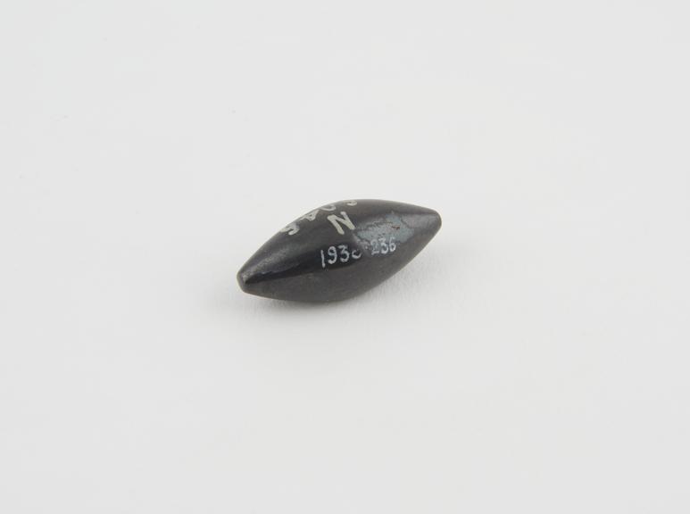 One of 5 haematite Syrian weights, barrel shaped, from Gaza