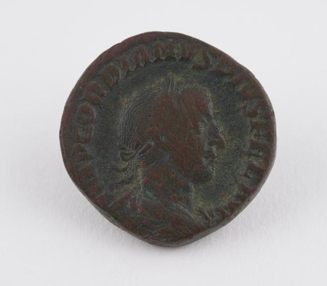 One of seven Roman bronze coins, Gordianus III A.D. 238-244.