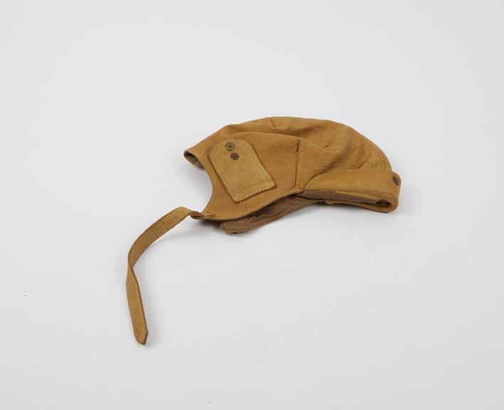 Yellow leather flying helmet, fabric lined, 1930-40.