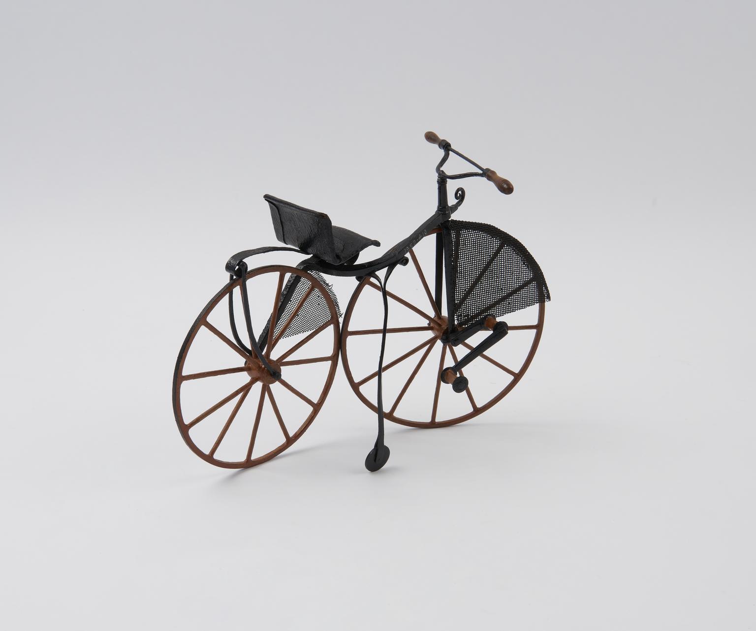 Model of a lady's boneshaker bicycle patented by Samuel Webb Thomas