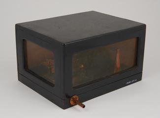 Moisture Apparatus; box  with inlet and outlet pipes